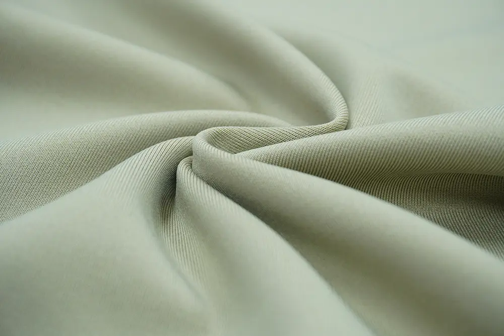 What is cotton spandex fabric, and what are its characteristics?